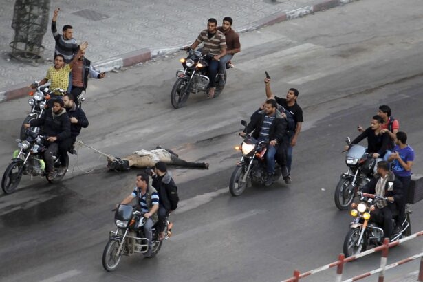 palestinian-gunmen-ride-motorcycles-they-drag-body-man-who-was-suspected-working-israel