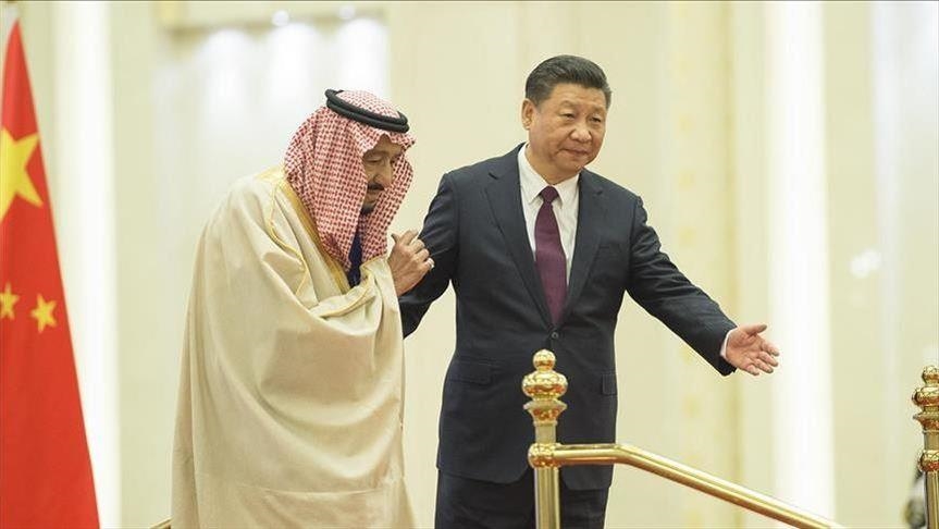 الرئيس الصيني خلال استقباله العاهل السعودي
