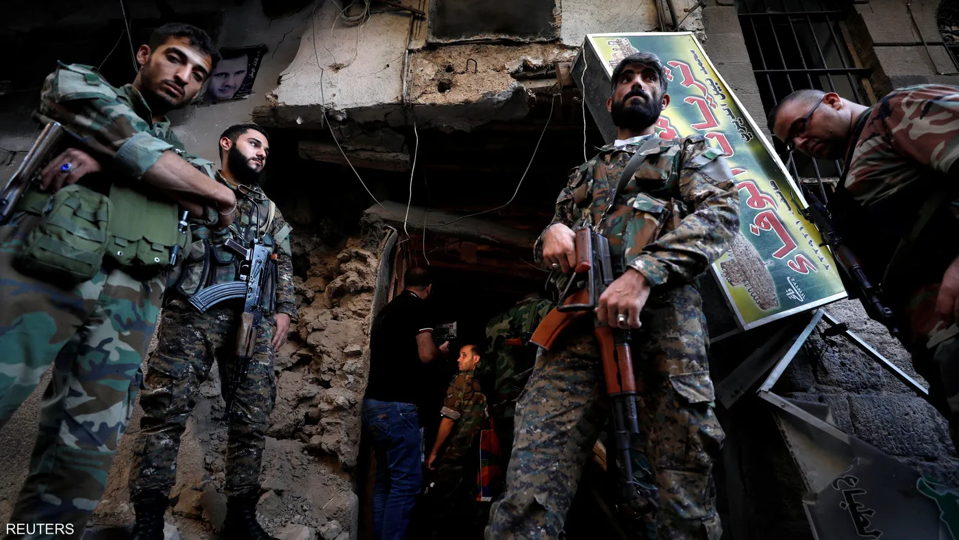 عناصر من قوات نظام الأسد (رويترز)